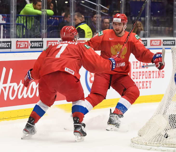 OSTRAVA, CZECH REPUBLIC - JANUARY 4: Russia's Yegor Sokolov #13 celebrates his first period goal against Sweden's with Alexander Khovanov #7 during semifinal round action at the 2020 IIHF World Junior Championship at Ostravar Arena on January 4, 2020 in Ostrava, Czech Republic. (Photo by Matt Zambonin/HHOF-IIHF Images)